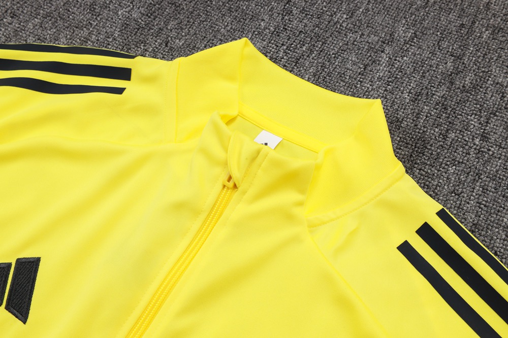 Real Madrid 25/26 Yellow Black Jacket Kit Foto 2