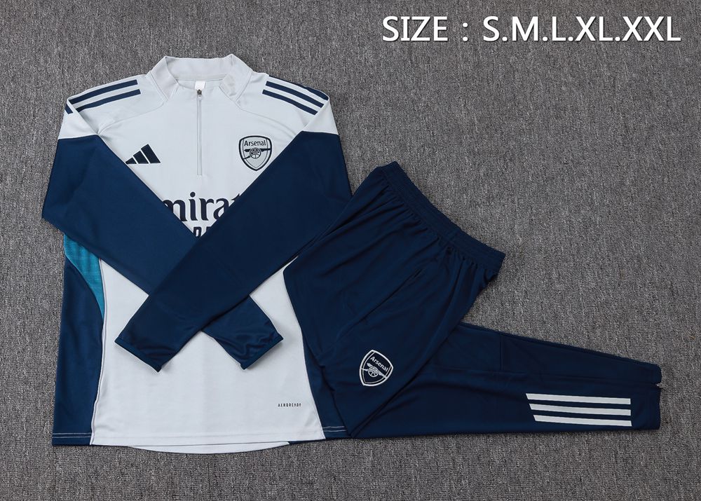 Arsenal 25/26 White Navy Teal Half Zip Tracksuit Foto 2