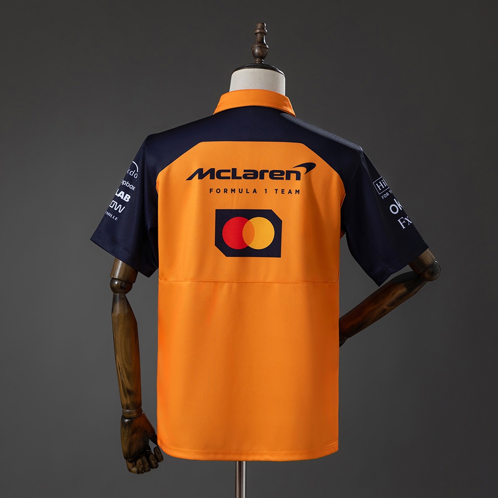 McLaren F1 Team 2025 Orange And Black Polo Shirt Foto 2